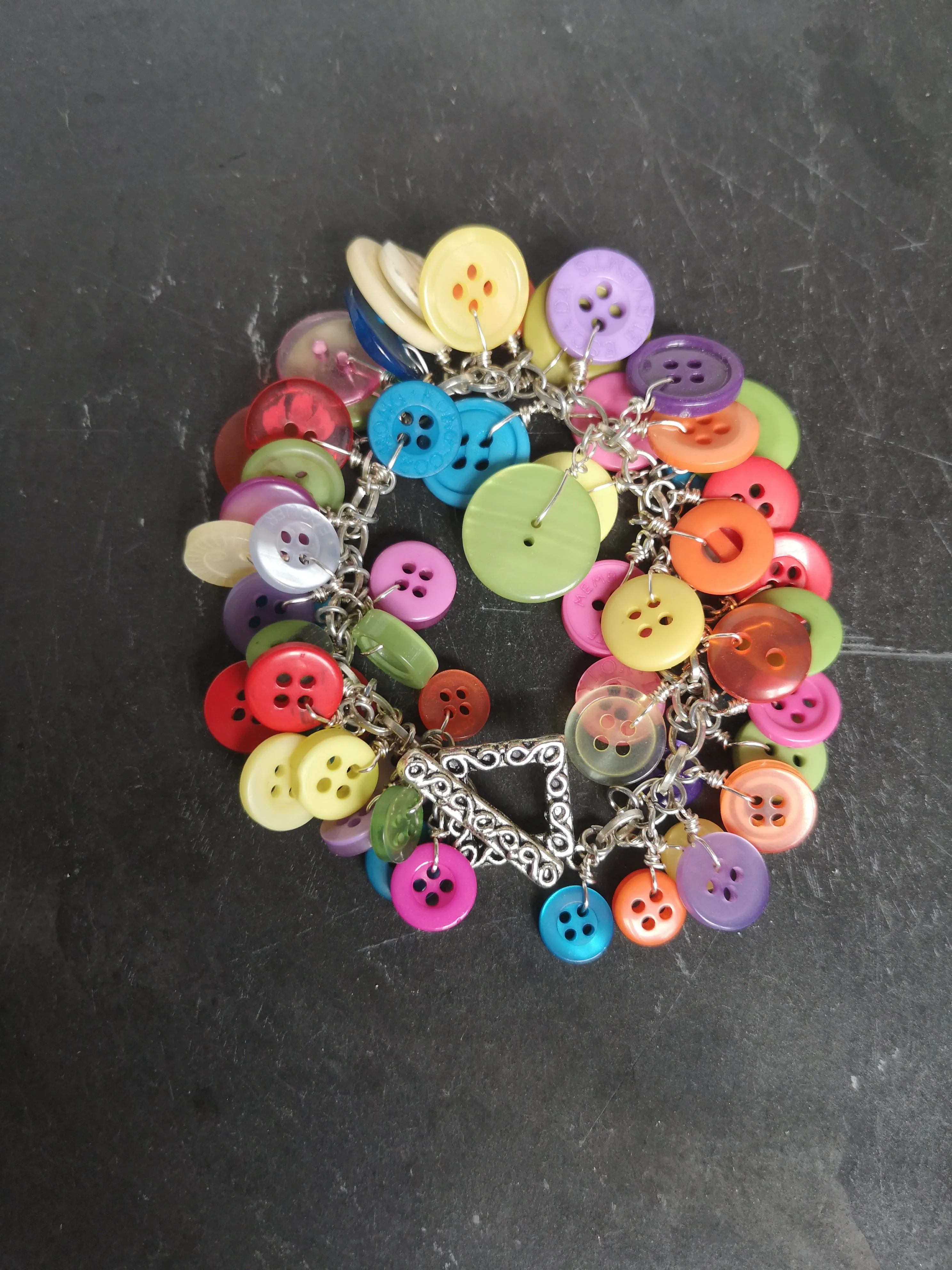 "Button me up" cute & fun cluster charm bracelet made with a rainbow of buttons,